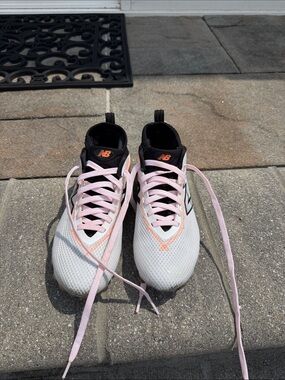 New Balance freeze cleats Women’s size 9